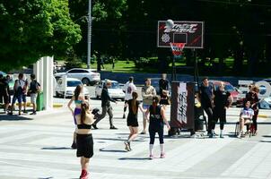 KHARKIV, UKRAINE - 27 MAY, 2018 Women's teams play streetball in the open air during the annual festival of street cultures photo