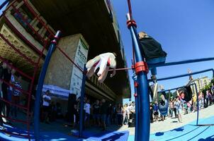 KHARKIV, UKRAINE - 27 MAY, 2018 Street workout show during the annual festival of street cultures photo