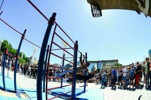 KHARKIV, UKRAINE - 27 MAY, 2018 Street workout show during the annual festival of street cultures photo