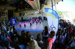 KHARKIV, UKRAINE - 27 MAY, 2018 Concert on the festival of street cultures. Break dance and hip-hop children and teenagers photo