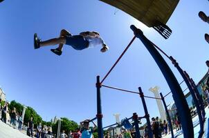 KHARKIV, UKRAINE - 27 MAY, 2018 Street workout show during the annual festival of street cultures photo