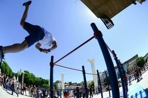 KHARKIV, UKRAINE - 27 MAY, 2018 Street workout show during the annual festival of street cultures photo