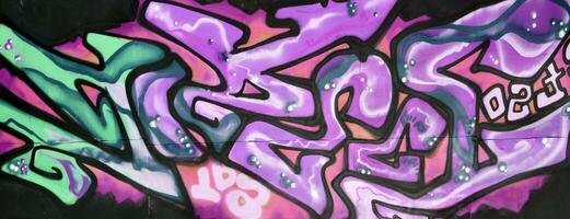 Colorful background of graffiti painting artwork with bright aerosol strips and beautiful colors photo