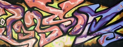 Colorful background of graffiti painting artwork with bright aerosol strips and beautiful colors photo