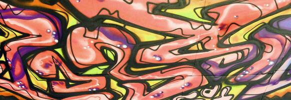 Colorful background of graffiti painting artwork with bright aerosol strips and beautiful colors photo