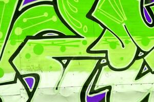 Colorful background of graffiti painting artwork with bright aerosol strips and beautiful colors photo