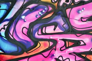 Colorful background of graffiti painting artwork with bright aerosol strips and beautiful colors photo