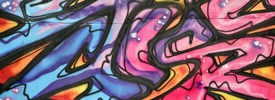 Colorful background of graffiti painting artwork with bright aerosol strips and beautiful colors photo