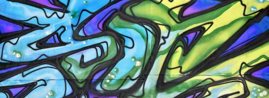 Colorful background of graffiti painting artwork with bright aerosol strips and beautiful colors photo