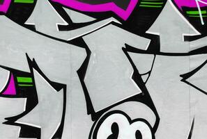 Colorful background of graffiti painting artwork with bright aerosol strips on metal wall photo