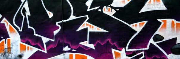 Colorful background of graffiti painting artwork with bright aerosol strips on metal wall photo