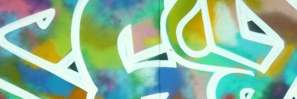 Colorful background of graffiti painting artwork with bright aerosol strips on metal wall photo