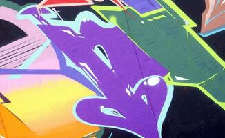 Colorful background of graffiti painting artwork with bright aerosol strips on metal wall photo
