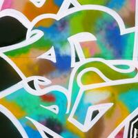 Colorful background of graffiti painting artwork with bright aerosol strips on metal wall photo