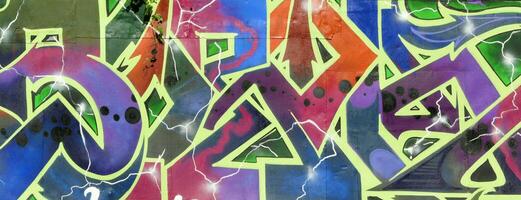 Colorful background of graffiti painting artwork with bright aerosol strips on metal wall photo