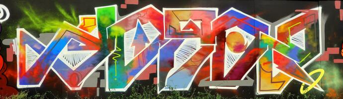 Colorful background of graffiti painting artwork with bright aerosol strips on metal wall photo