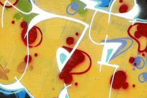 Colorful background of graffiti painting artwork with bright aerosol strips on metal wall photo