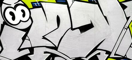 Colorful background of graffiti painting artwork with bright aerosol strips on metal wall photo