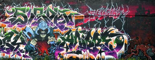 Colorful background of graffiti painting artwork with bright aerosol strips on metal wall photo