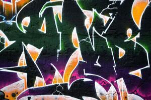 Colorful background of graffiti painting artwork with bright aerosol strips on metal wall photo