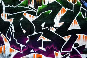 Colorful background of graffiti painting artwork with bright aerosol strips on metal wall photo