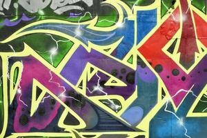 Colorful background of graffiti painting artwork with bright aerosol strips on metal wall photo