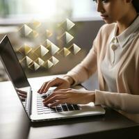 Email marketing. Woman typing on laptop keyboard. photo