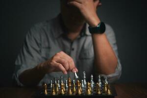 Success and plan in Business Strategy. Businessman in a Chess Game of Skill and Critical Thinking photo