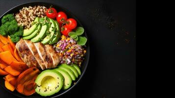 Red quinoa bowl with avocado, radishes, scallions, cherry tomatoes, chives and fresh basil. Top view. Copy space. photo