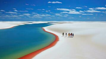 Tourists walking on desert sand dunes with red river aerial view at sunset,Generated with AI photo