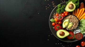 Red quinoa bowl with avocado, radishes, scallions, cherry tomatoes, chives and fresh basil. Top view. Copy space. photo