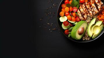 Red quinoa bowl with avocado, radishes, scallions, cherry tomatoes, chives and fresh basil. Top view. Copy space. photo