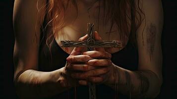 Woman's hands with a cross. Faith. Christianity. Religion. Church. Cross. photo