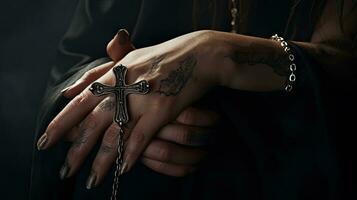 Woman's hands with a cross. Faith. Christianity. Religion. Church. Cross. photo