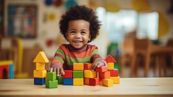 Cute little African American child learning Playing with wooden blocks in the house photo