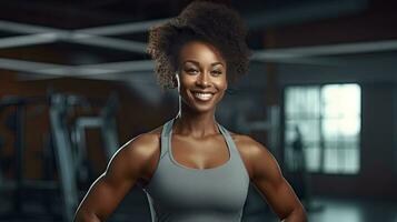 Black woman fitness, beautiful Afro-American woman with curly hair in the gym African fitness woman at health club photo