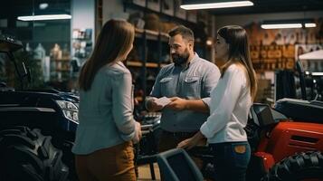 Female tractor salesperson stands in showroom and guarantees spare parts and service of agricultural machinery. photo