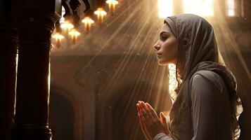 Religious Muslim woman praying in a church photo