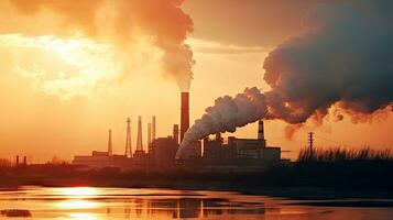 Chemical factory with smokestack Smoke from factory pipes at sunset, ecological problems and air pollution photo