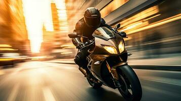 Motorcyclist with helmet at high speed, blurred lights, city road photo