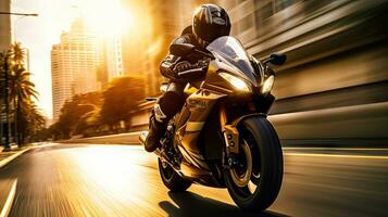 Motorcyclist with helmet at high speed, blurred lights, city road photo