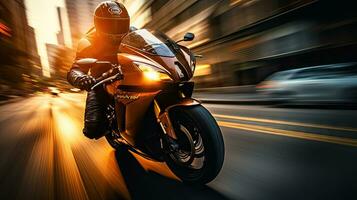 Motorcyclist with helmet at high speed, blurred lights, city road photo