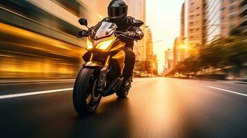 Motorcyclist with helmet at high speed, blurred lights, city road photo