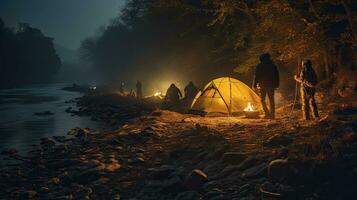 Night camping on the banks of male and female hikers There is thick fog along the river. photo