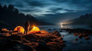 Night camping on the banks of male and female hikers There is thick fog along the river. photo