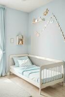 minimalist kids room with beige wall photo