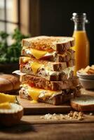 sandwich with mixed ingredients and french fries on a wooden board photo