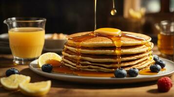 breakfast pancakes on plate with honey and berries photo