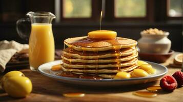 breakfast pancakes on plate with honey and berries photo