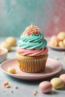 Delicious cupcakes on table on soft pastel background photo